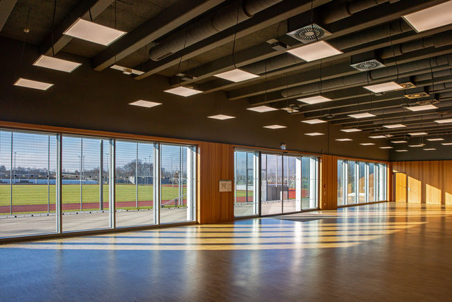 View of the gymnasium at Freiham Sports Park, looking outwards