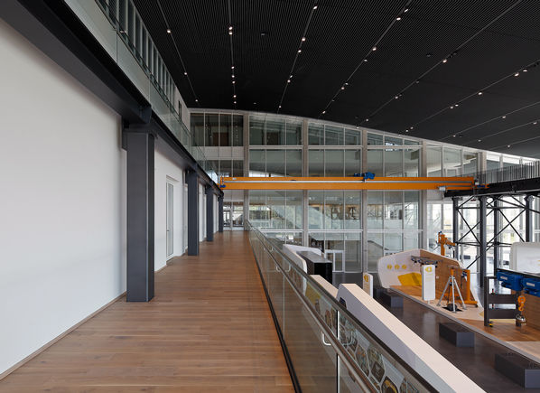 Entrance to the crane girder with glass balustrade on the right.