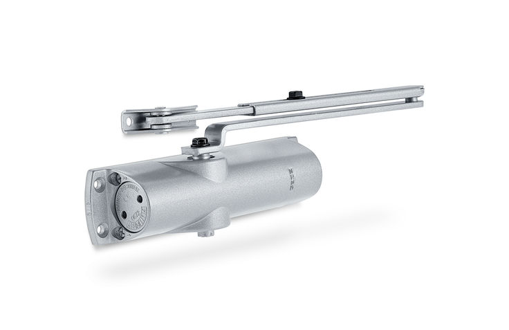 升降门闭门器 TS 1000 C 上置闭门器适用于最大门扇宽度达 950 mm 的单扇门。关门速度及液压闭锁均是可调节的。通过翻转折臂的轴承块，闭门力级可在两种大小之间切换。